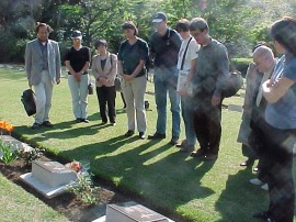 before their Grandfather's grave