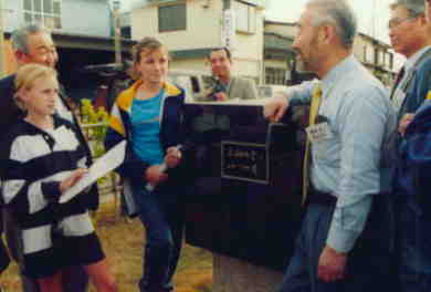 Molong people listen to the explanation of the site.