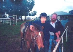 Hiro riding a horse